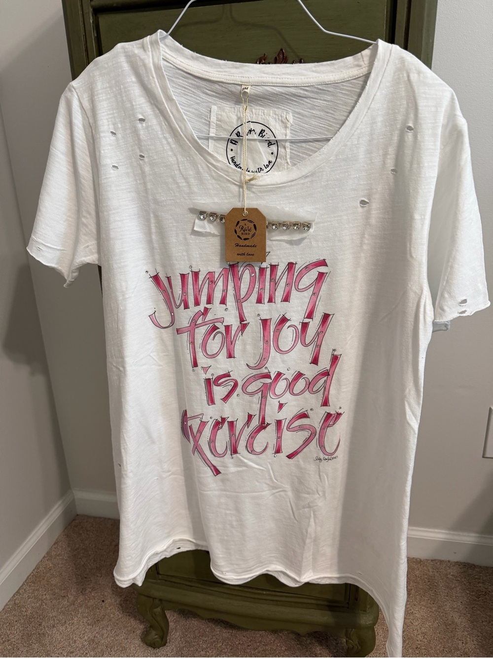 A Rare Bird brand t-shirt. NWT